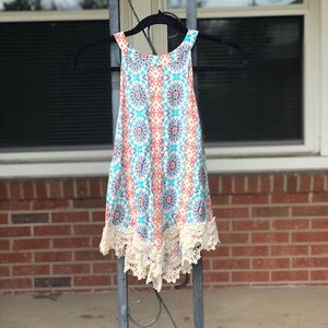 High neck flowy tank from blush boutique 🌸🌼
